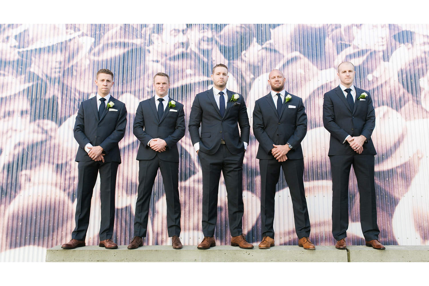 Groomsmen posing in North Vancouver during bridal party photos.
