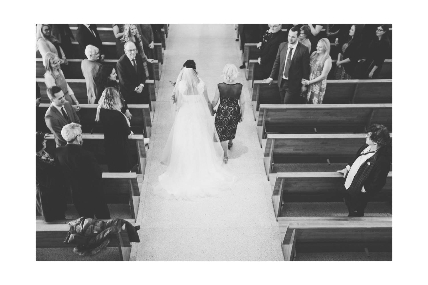 Vancouver wedding photographer image of the bride walking down the aisle.