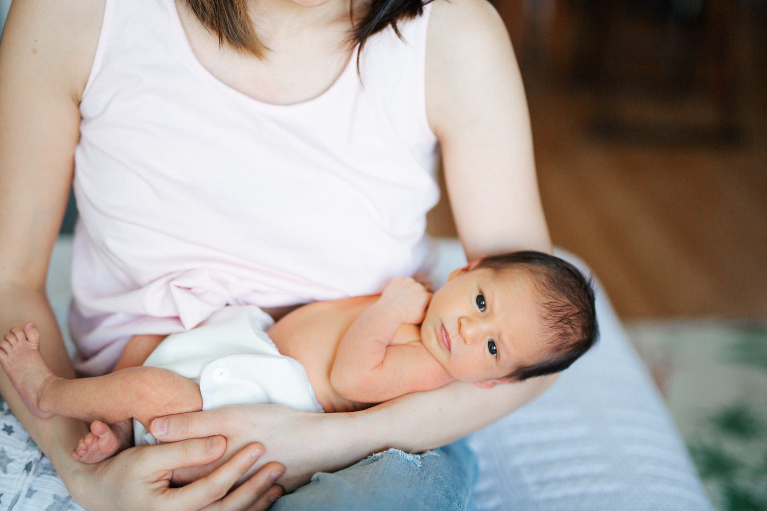 family posing at east vancouver newborn photography shoot