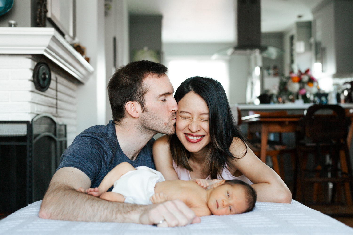 family posing at east vancouver newborn photography session