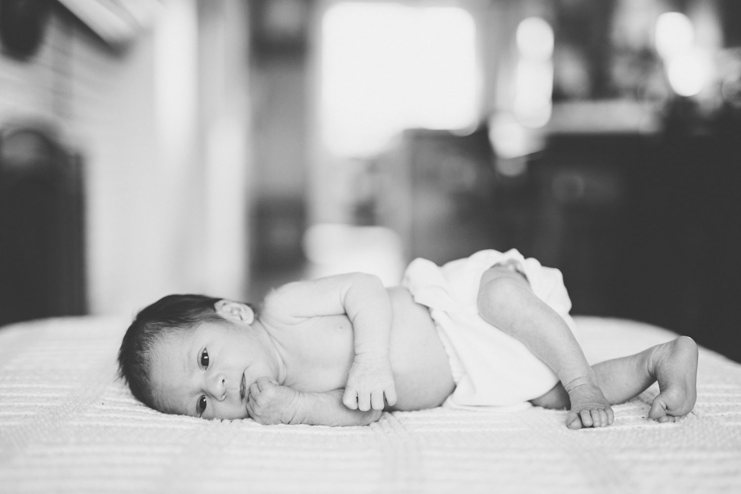 family posing at east vancouver newborn photography shoot