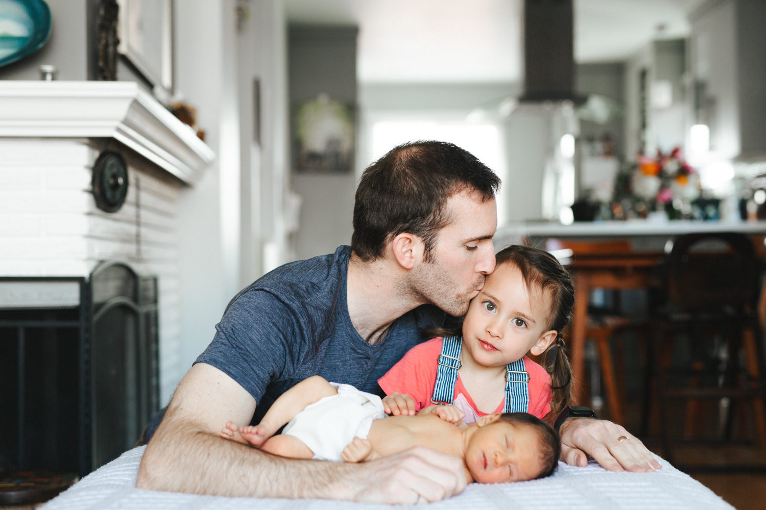 family posing at east vancouver newborn photography shoot