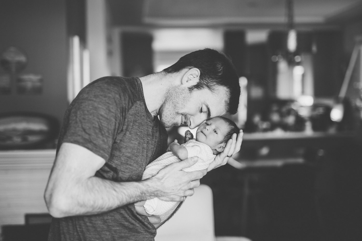 family posing at east vancouver newborn photography shoot