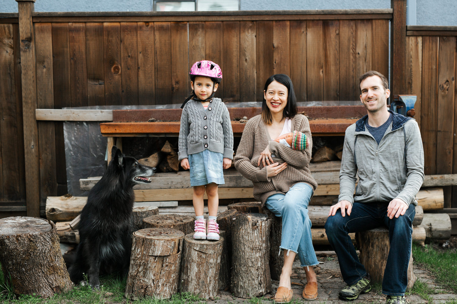 family posing at east vancouver newborn photography shoot