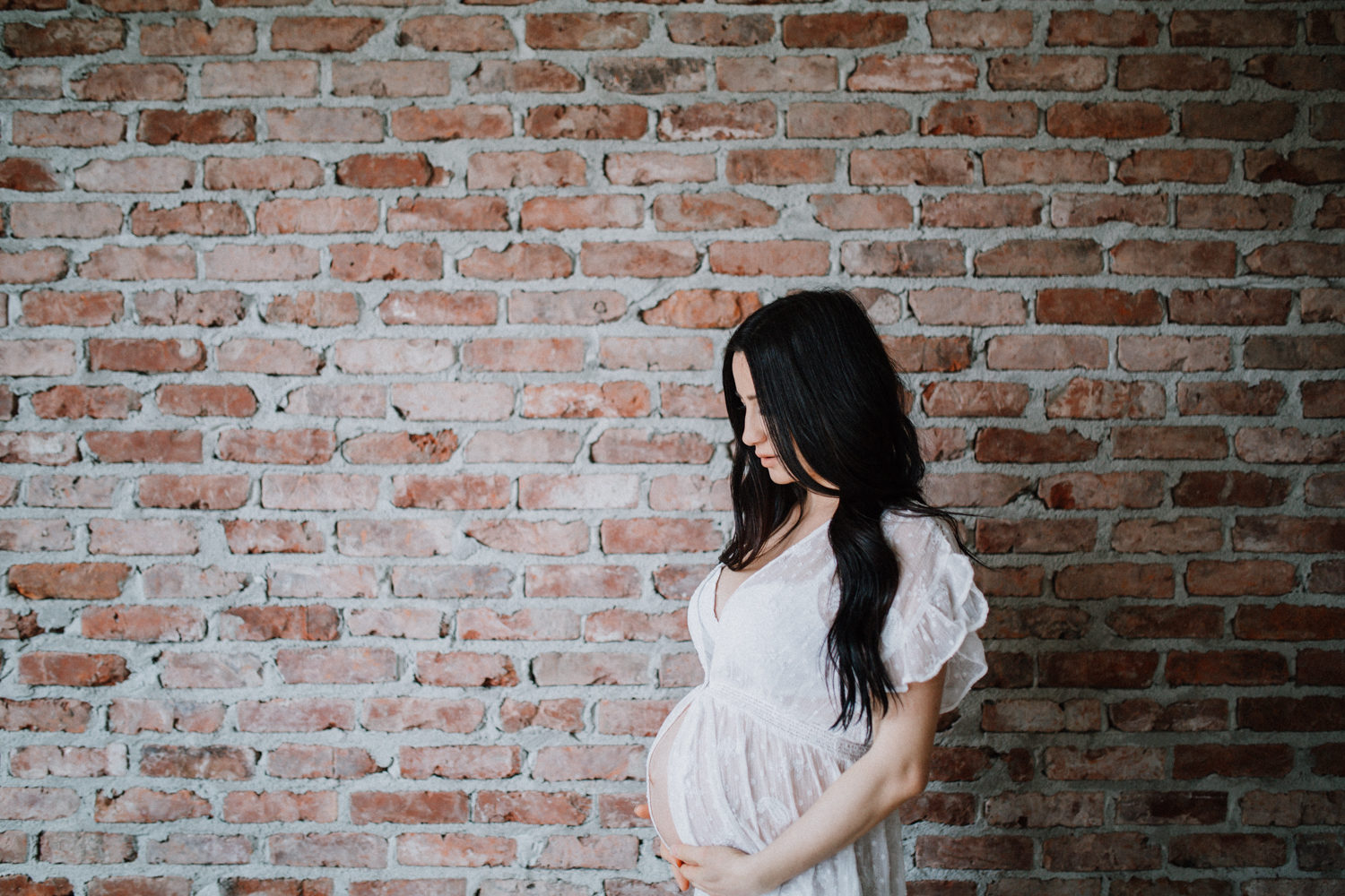 bride posing at new Westminster maternity 