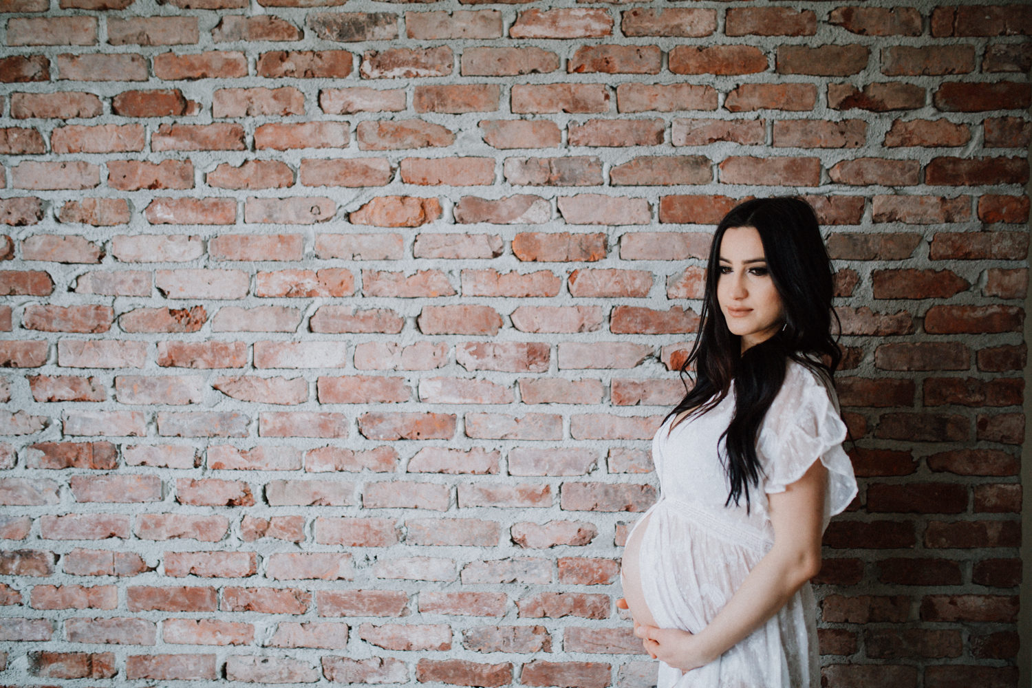 bride posing at new Westminster maternity 