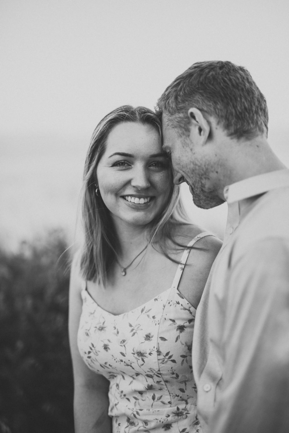 couple posing at boundary bay engagement
